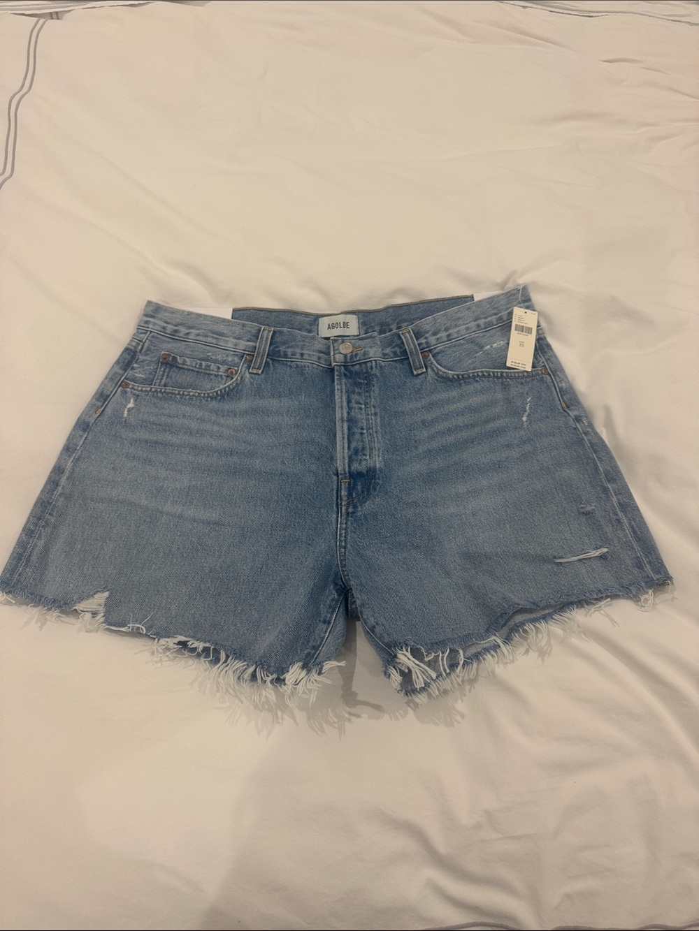 Agolde Light Wash Frayed Hem Denim Shorts